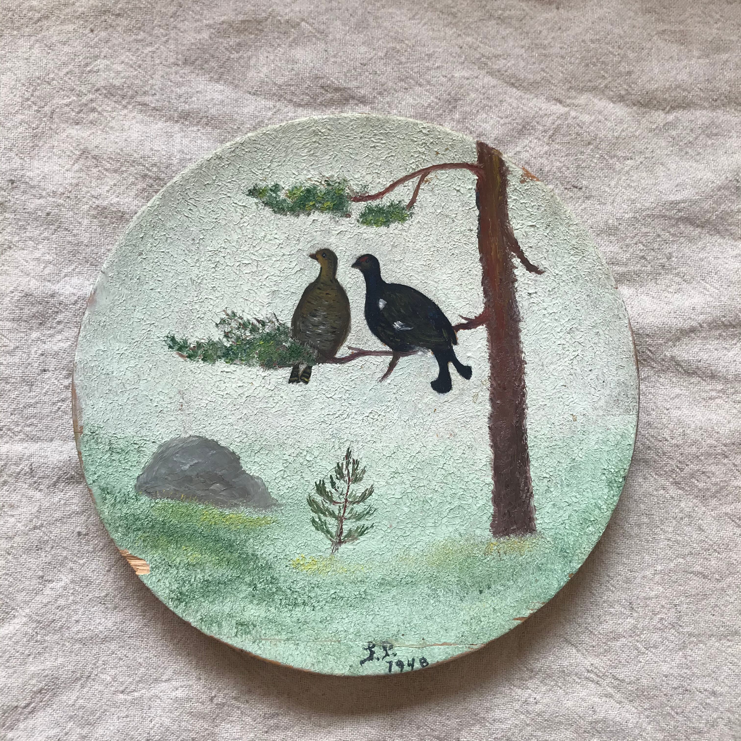 木製の鳥の飾り皿