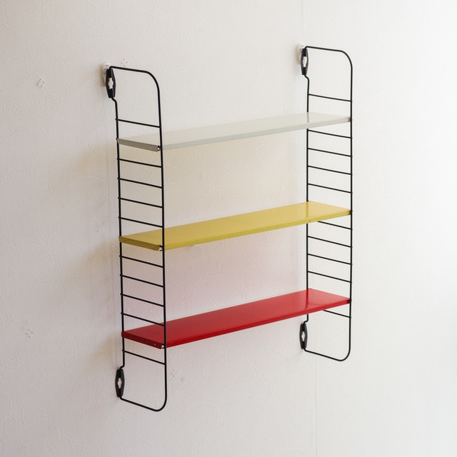 TOMADO WALL SHELF  ”pocket book rack” | Adrian Dekker | 1960s