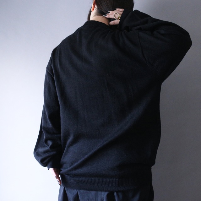 fake leather taping design over silhouette sweater
