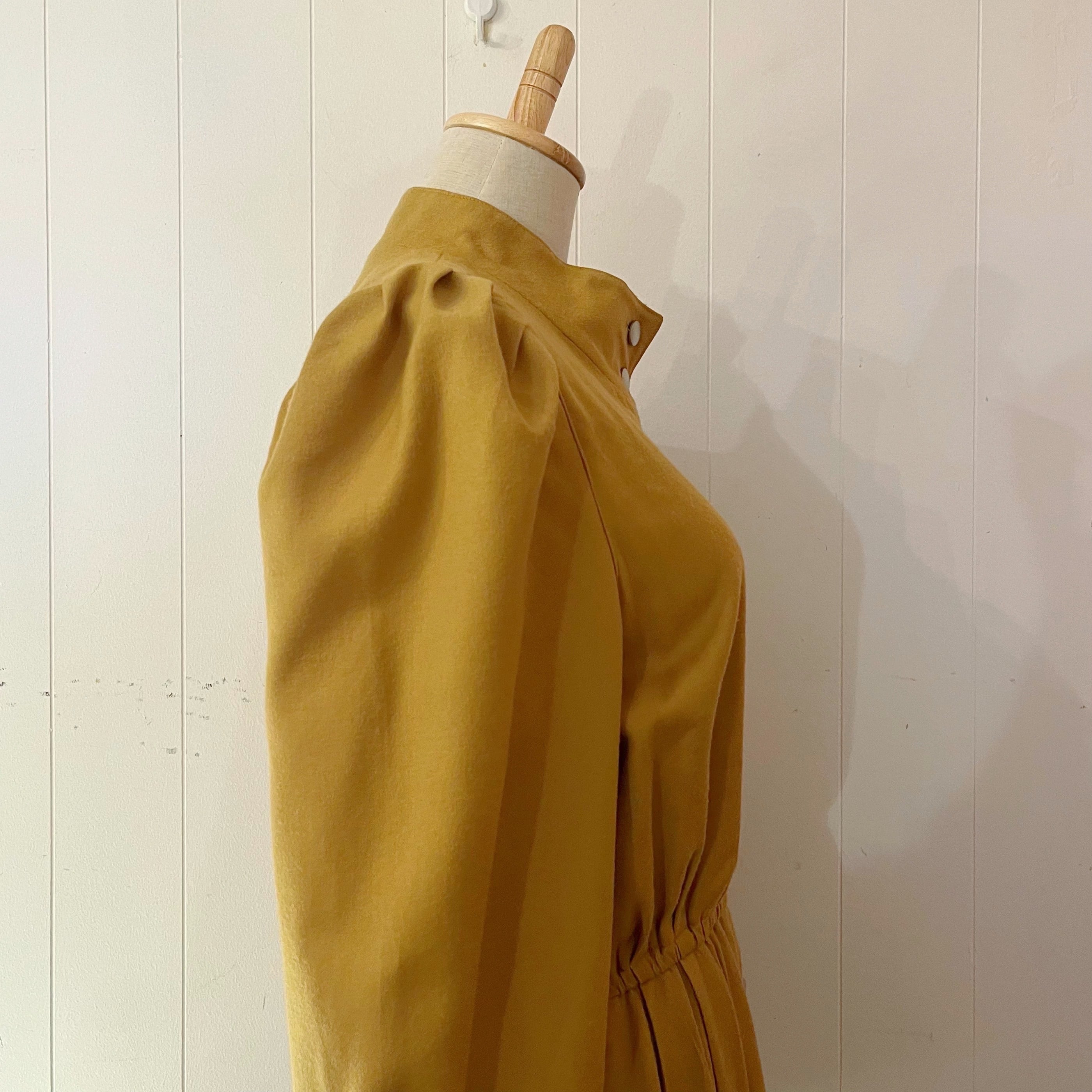 mustard front metal button one-piece