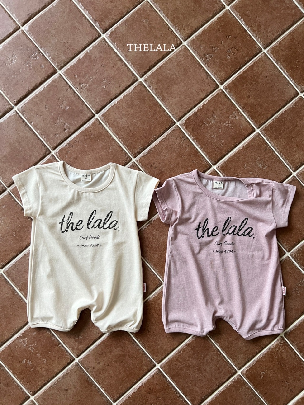 [THELALA] Lettering Bodysuit / [더랄라] 레터링슈트