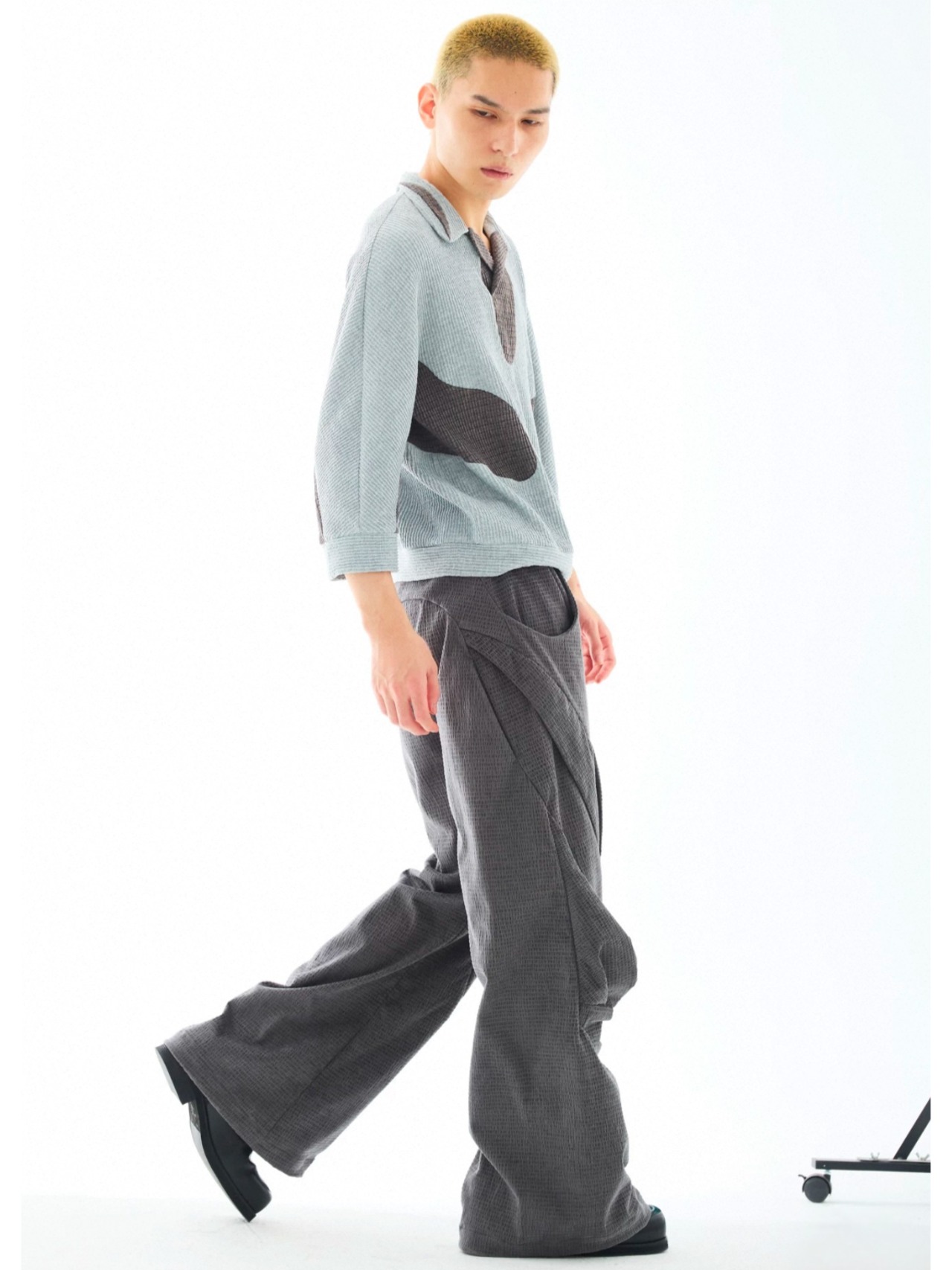 54A0 Spiral Pleated Wide Trousers