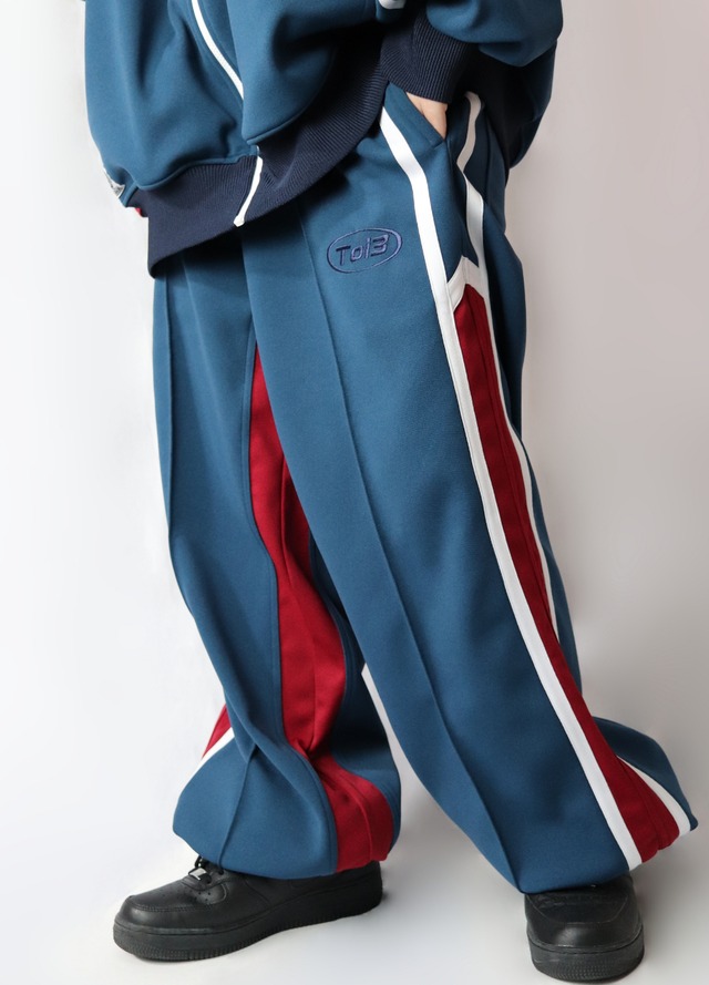 Center pleat side line wide jersey pants (センタープリーツサイドラインワイドジャージパンツ)【Purple×Black】