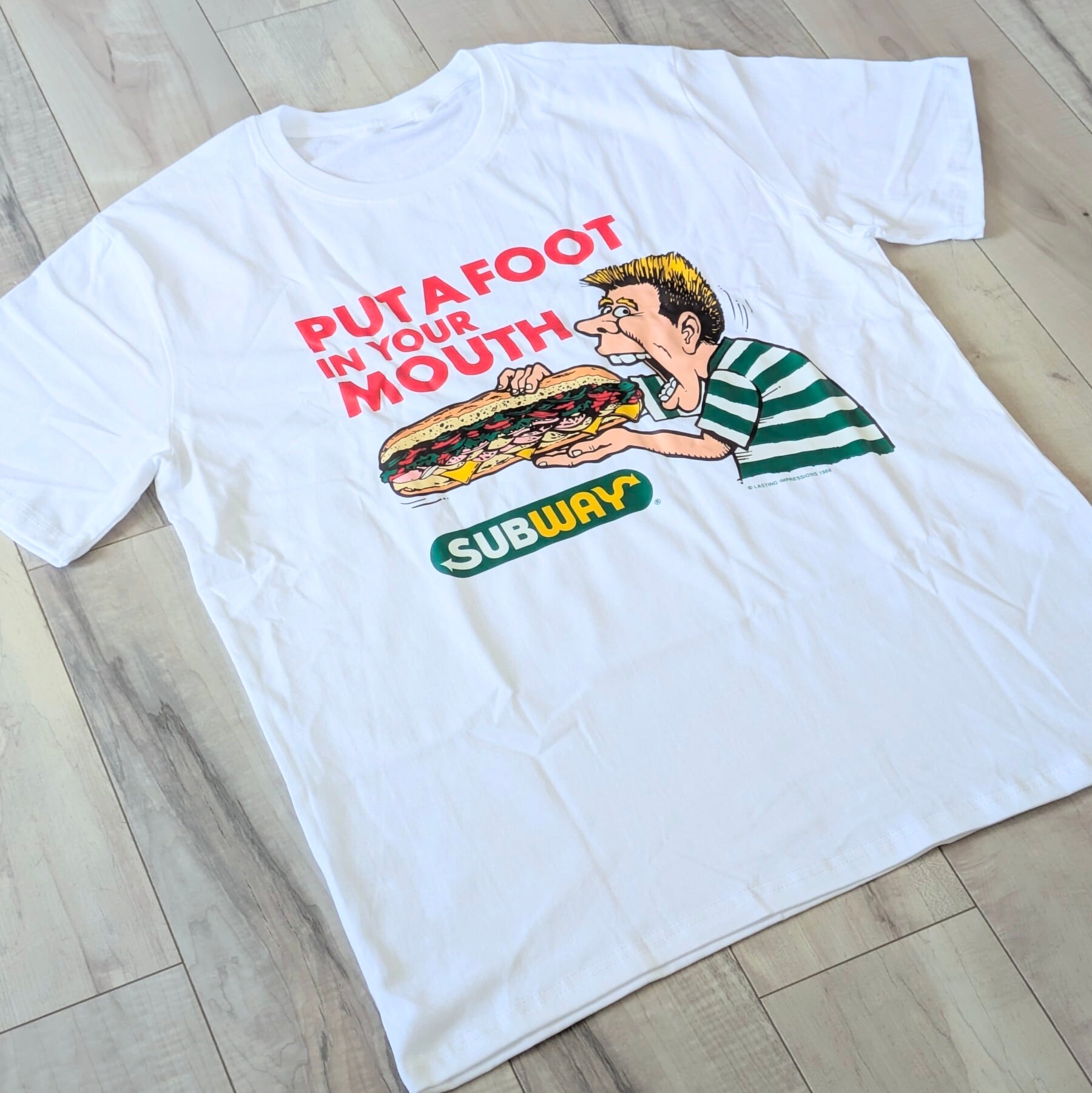 ♧【 SUBWAY ( サブウェイ )】『 PUT A FOOT IN YOUR MOUTH 』Tシャツ 〚アメリカン雑貨 アメトイ〛
