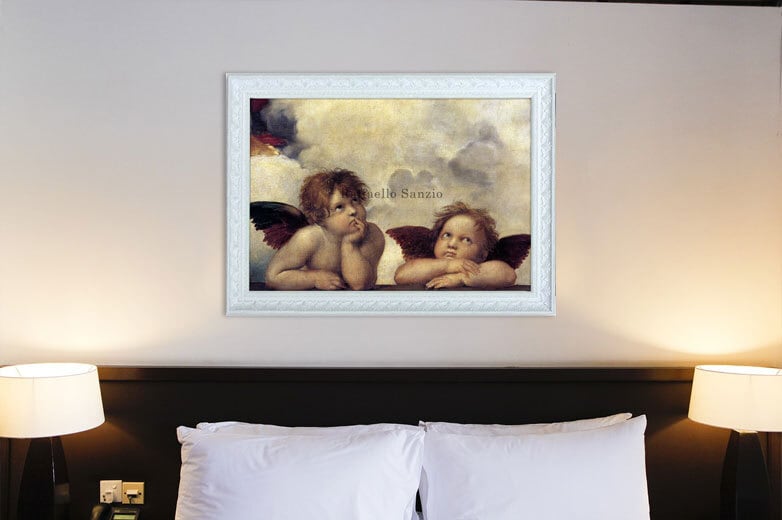 ラファエロ・サンティの「システィーナの聖母」の上を見つめる二人の