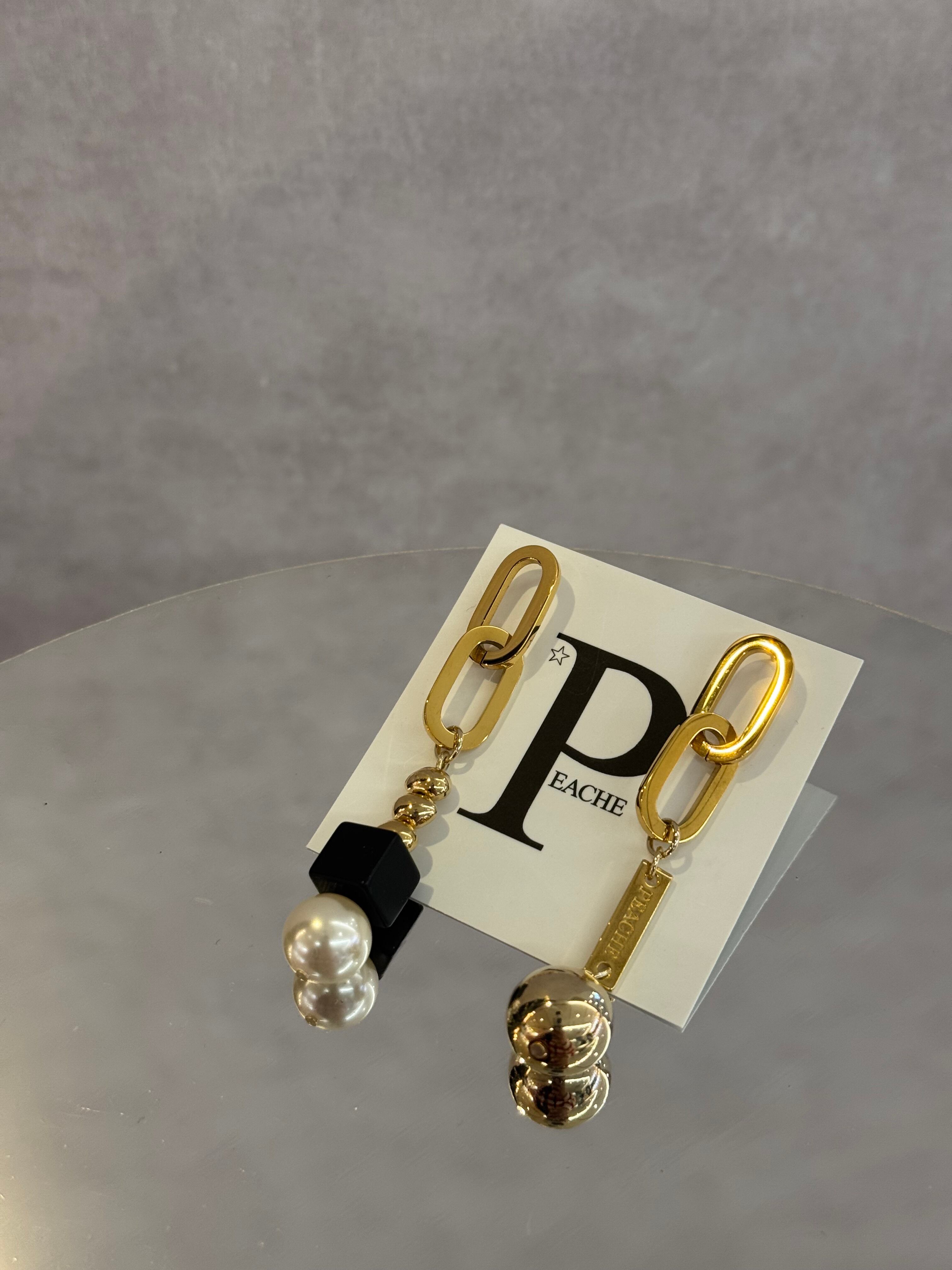 gold chain onyx pearl drop asymmetry