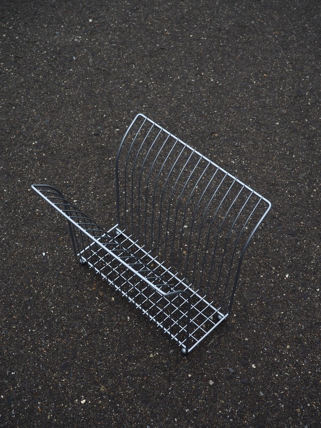 Grey wire magazine rack