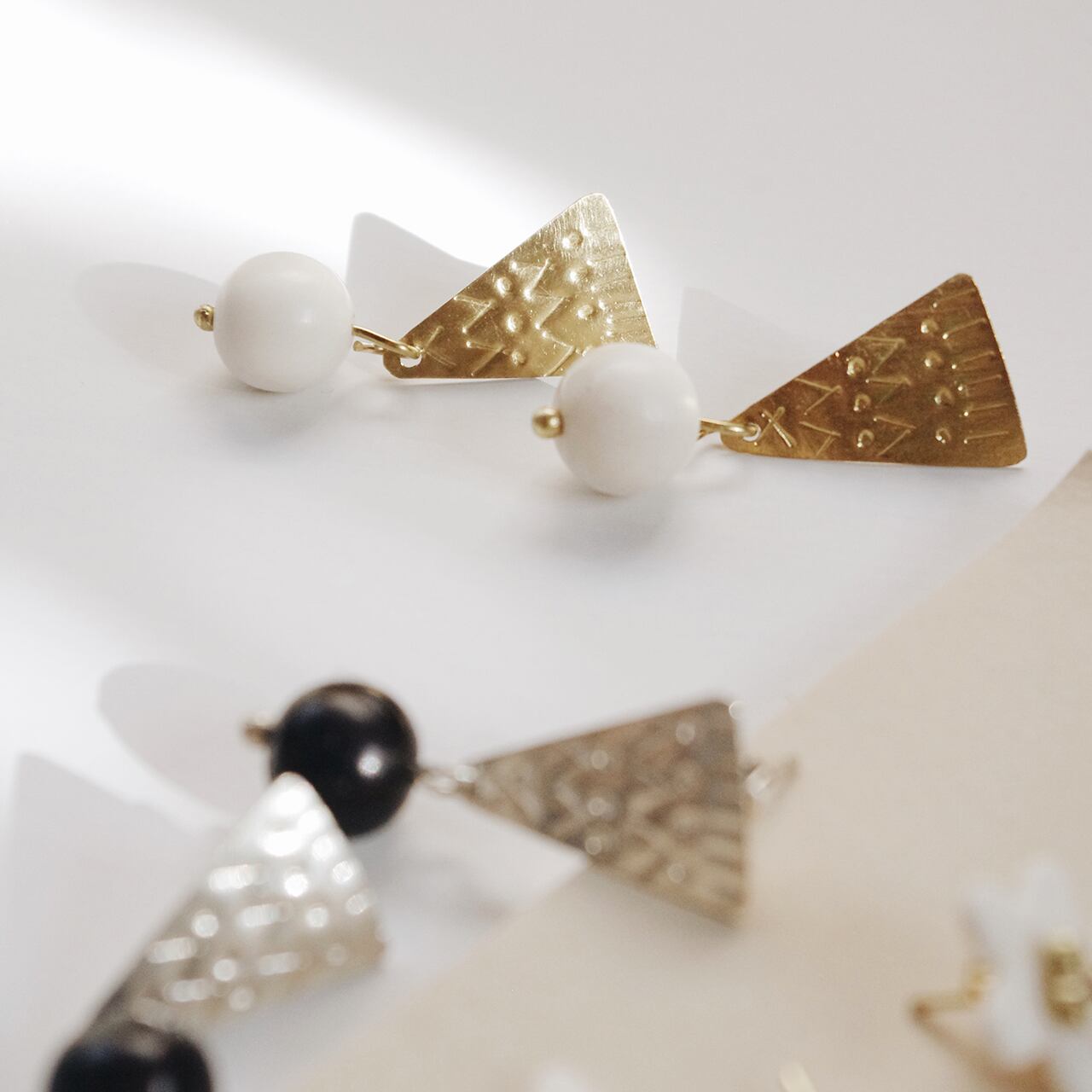 Bone & Triangle stud pierce