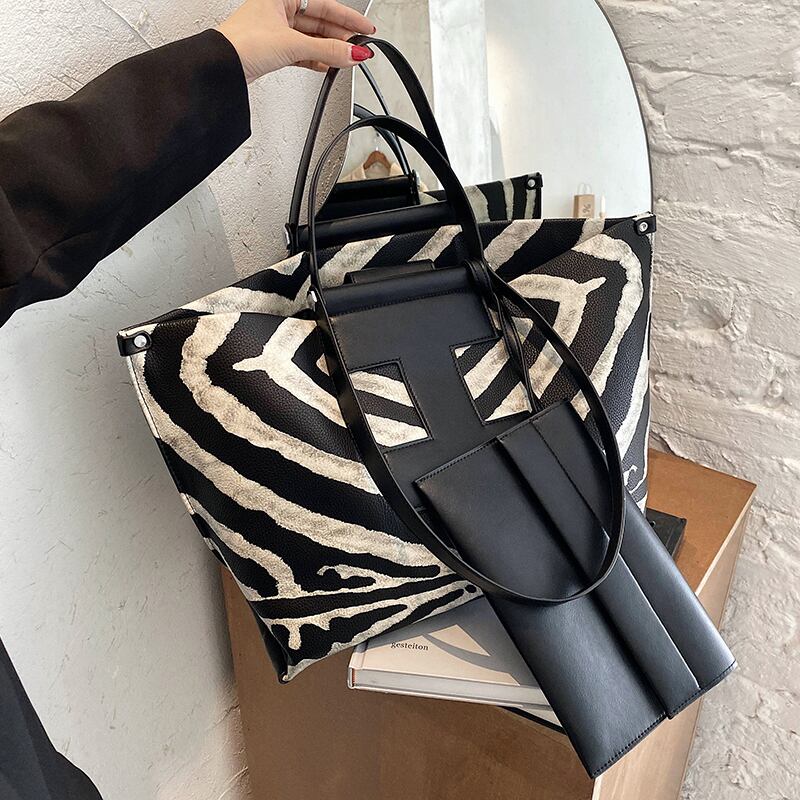 レトロなワンショルダーレディースビッグバッグ2020人気の新しい流行のファッションネットレッドワイルド大容量ポータブルトートバッグ Tiancai_Wing_Bag24902555389