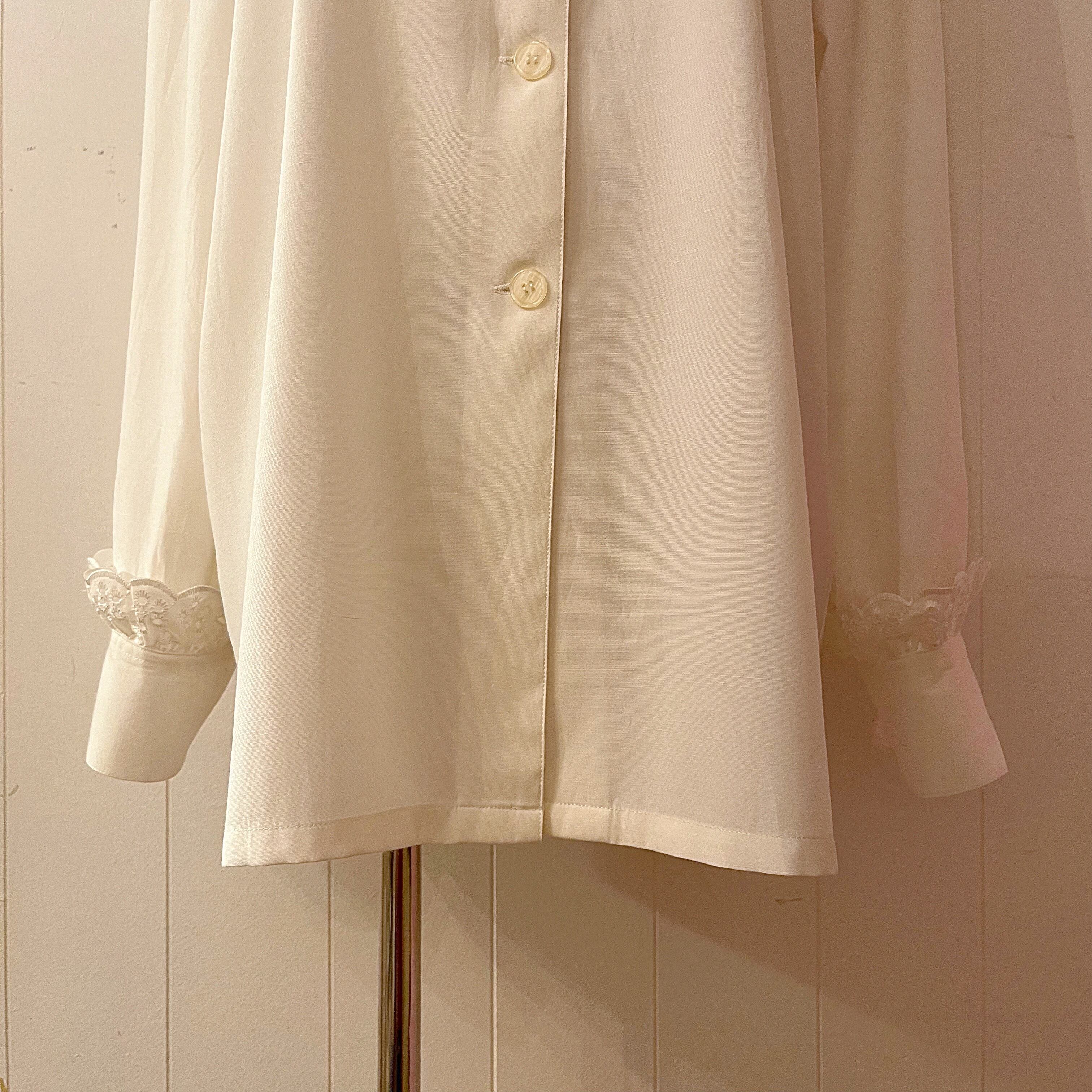 big frill cuffs white blouse