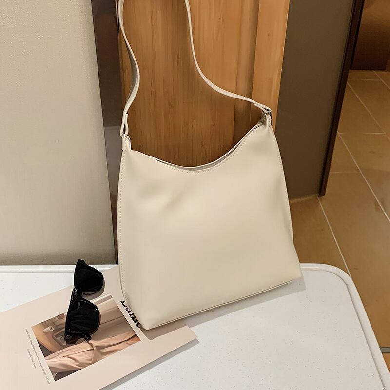 白いバッグ女性の小さなバッグ2020新しい波夏のファッションシンプルなショルダーバッグネット赤い海の野生のバケットバッグ Tiancai_Wing_Bag8280682