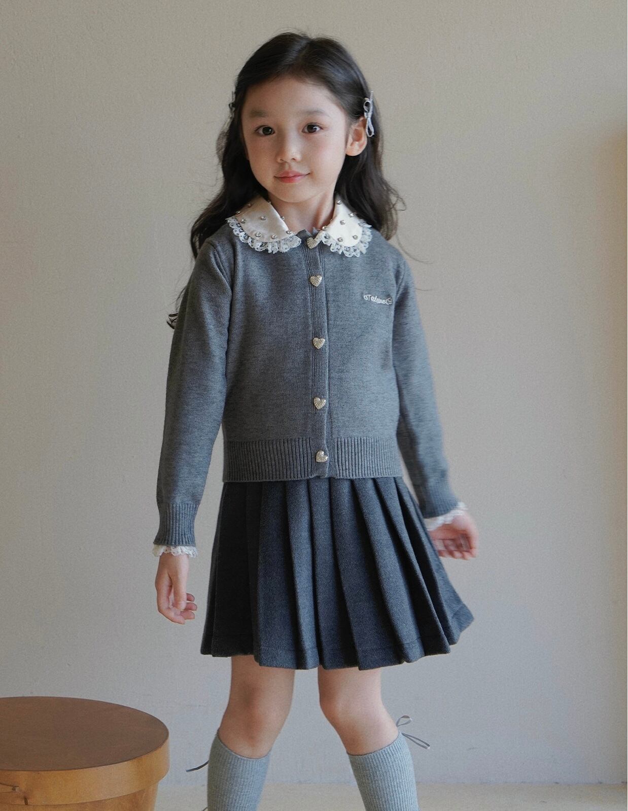 Stone neck color frill cardigan