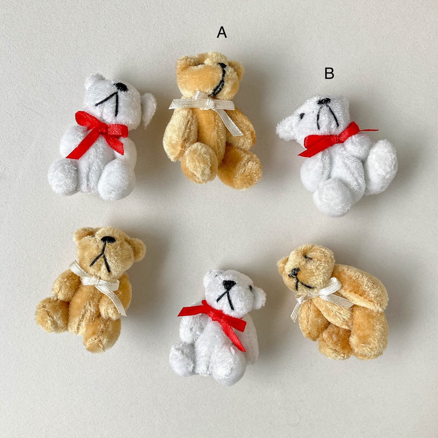 リボンをつけたテディベアチャーム | Dua-アクセサリーパーツショップ