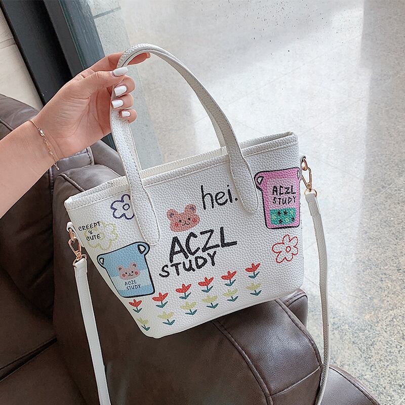 eignレディースバッグ2020夏の新しいトレンドラインワイルドショルダーメッセンジャーバッグinsファッションバケットバッグ Tiancai_Wing_Bag3932719