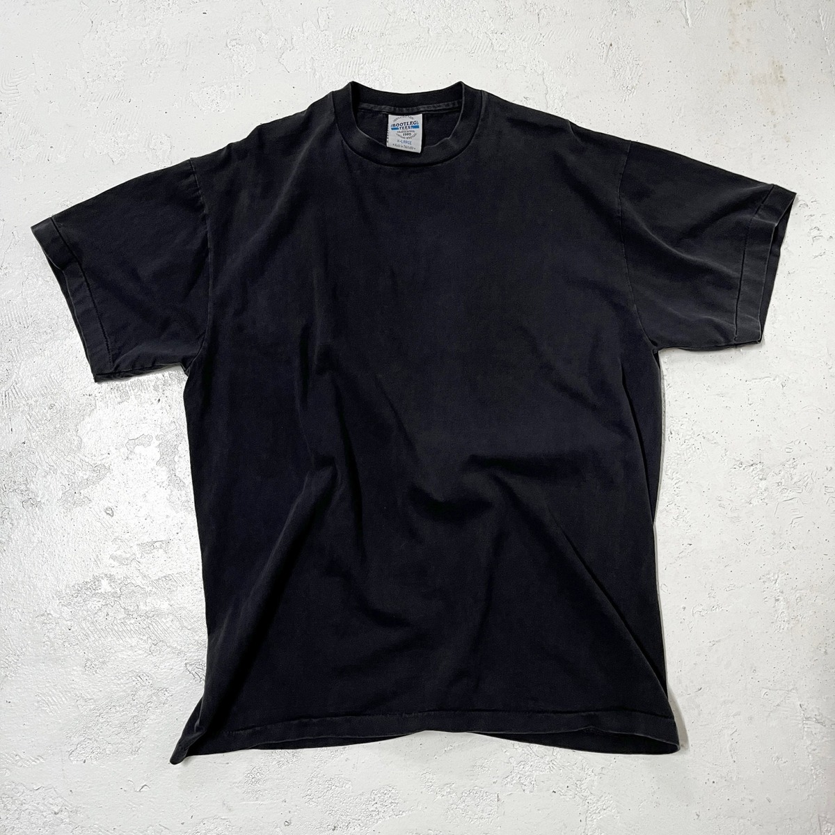 [NAZCA/ユニセックス] newフェードブラック・オルタナティブ Tシャツ (XL)