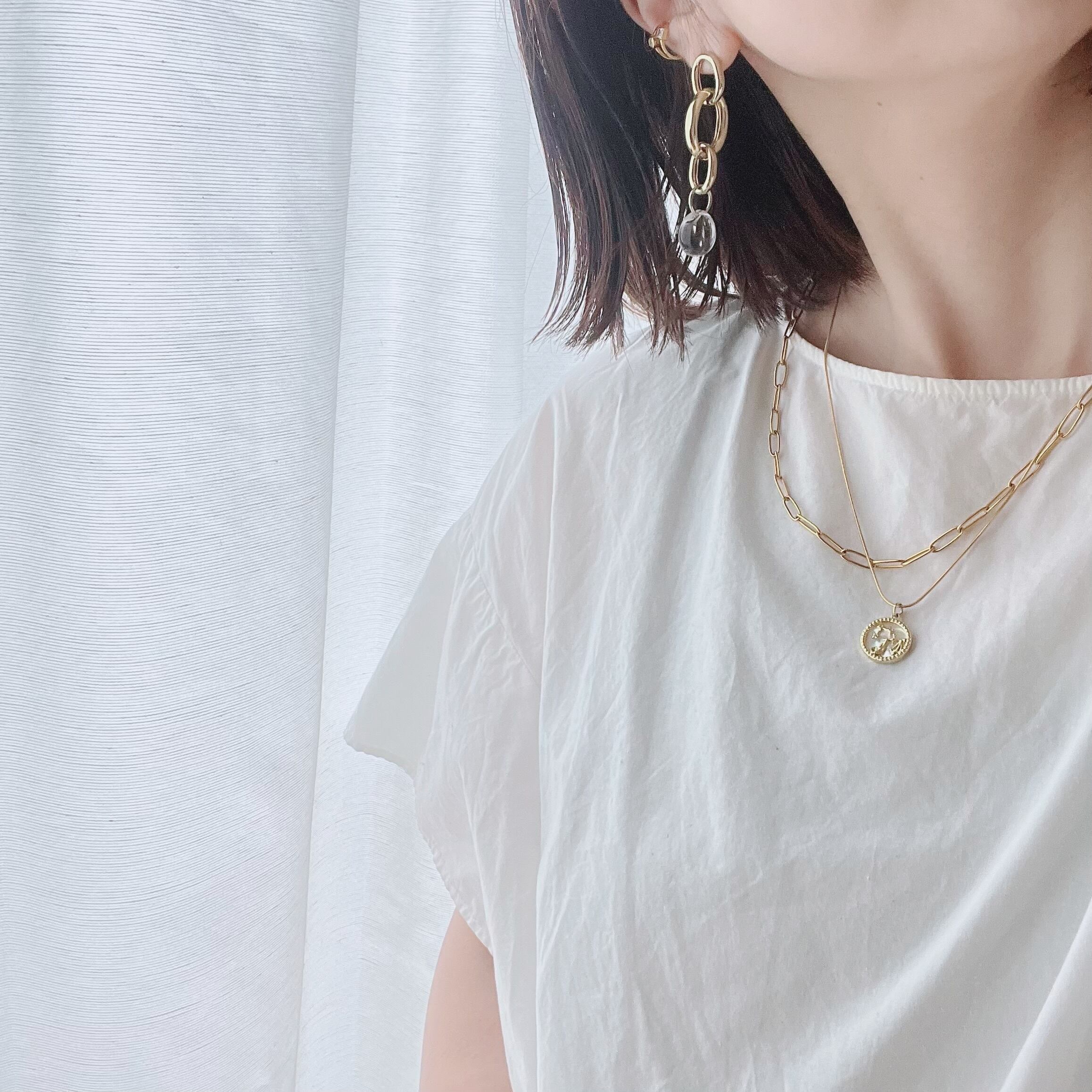 おひつじ座〉星座シェル コインネックレス 18KGPサージカルステンレス