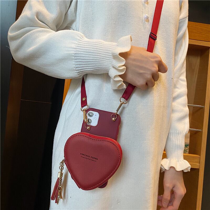 スマホケース iPhoneケース 2色 カバーケース スマホショルダー 携帯ケース スマホカバー ハート型 かわいい キュート ガーリー カジュアル おしゃれ 可愛い カワイイ ラブリー 個性的 無地 ハート型コインケース ショルダーストラップ 2カラー ブラック ワインレッド 黒 赤 10代 20代 ペア デート お出かけ 送料無料 女子会 お泊まり 休日 旅行 お買い物 デイリー 収納力 チェーン プレゼント ギフト トレンド 流行 インスタ映え 肩掛け 送料無料 斜め掛け 便利 小物入れ 街歩き