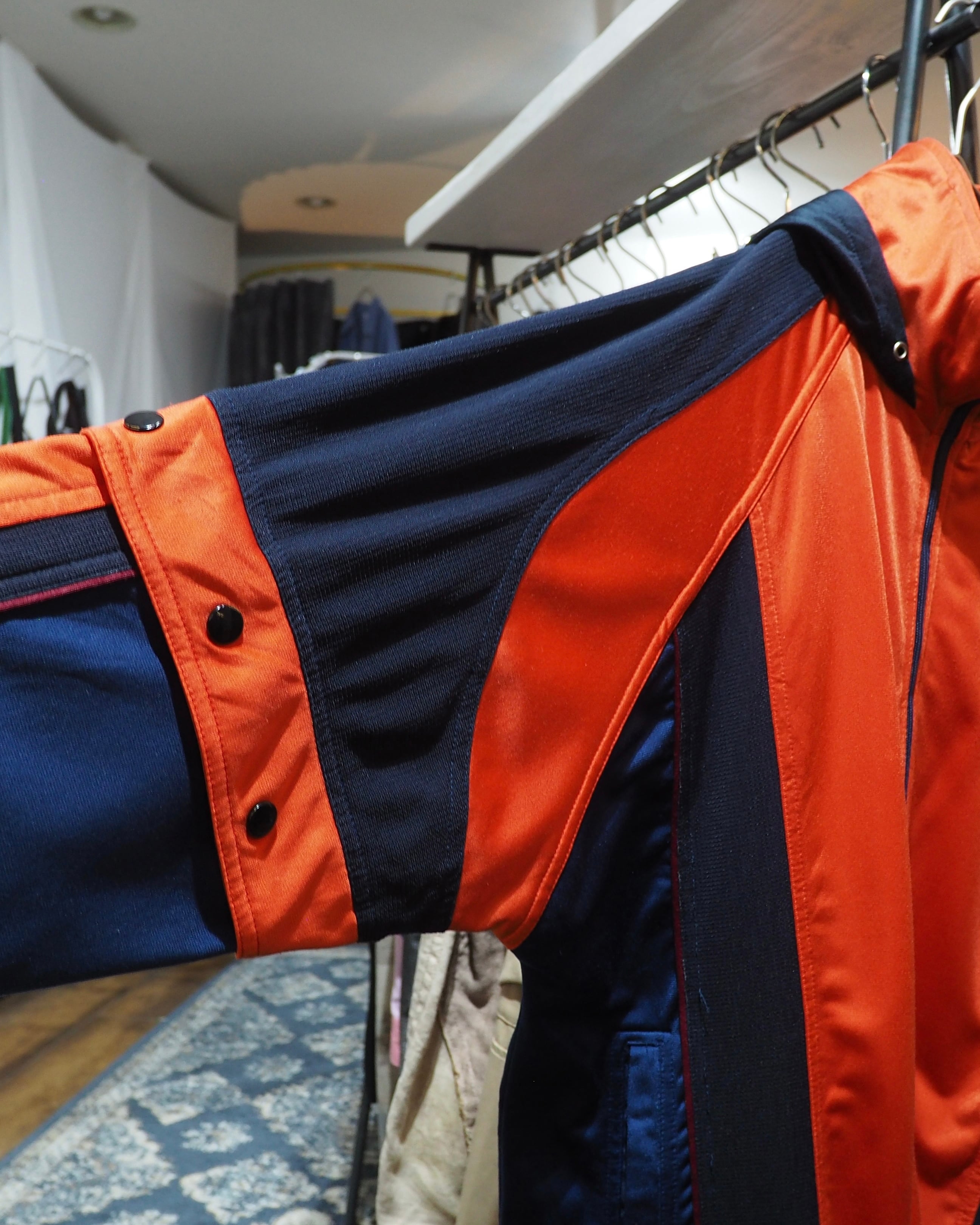 1990s " UMBRO " Vivid Orange × Dark Navy Switching Panel Vintage Loose Track Jacket
