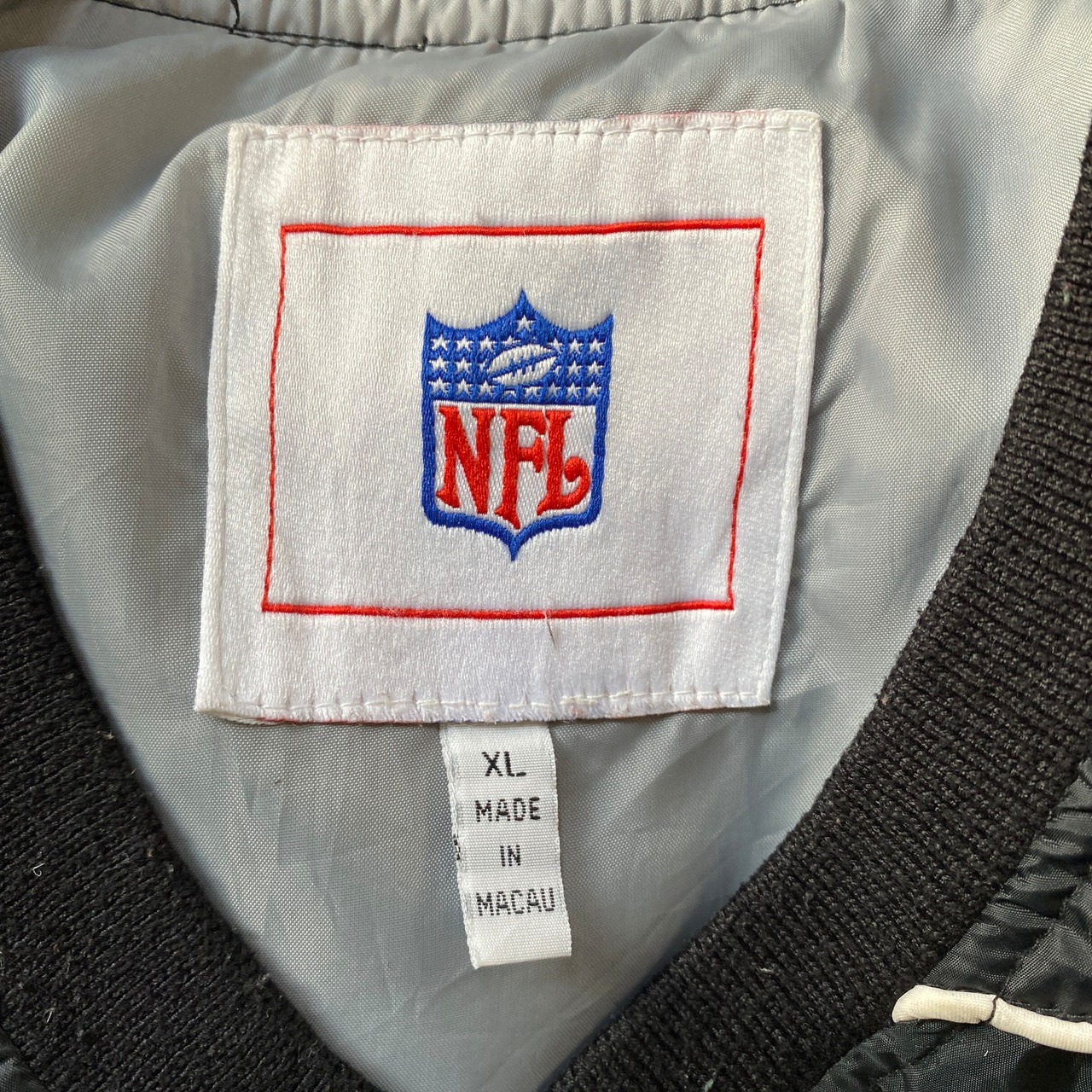 NFL ラスベガス・レイダース ナイロンプルオーバー メンズXL 古着 
