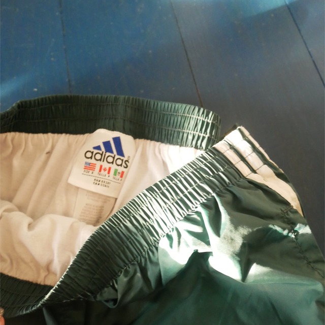 Adidas track pants green