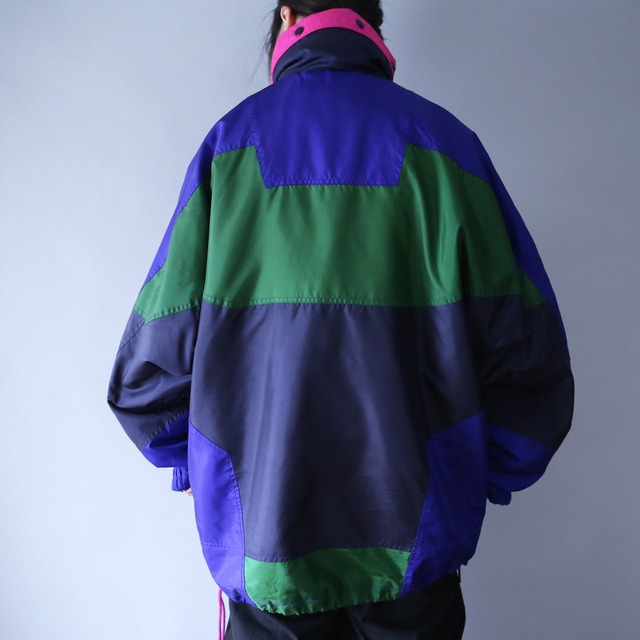 psychedelic multi coloring over silhouette tech half-zip pullover