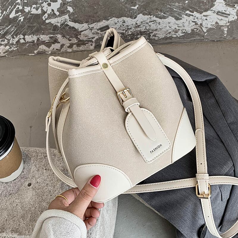 センススモールバッグレディースバッグバケットバッグ2020新しい流行のファッションつや消しショルダーバッグネットレッド人気メッセンジャーバッグ Tiancai_Wing_Bag50795752588