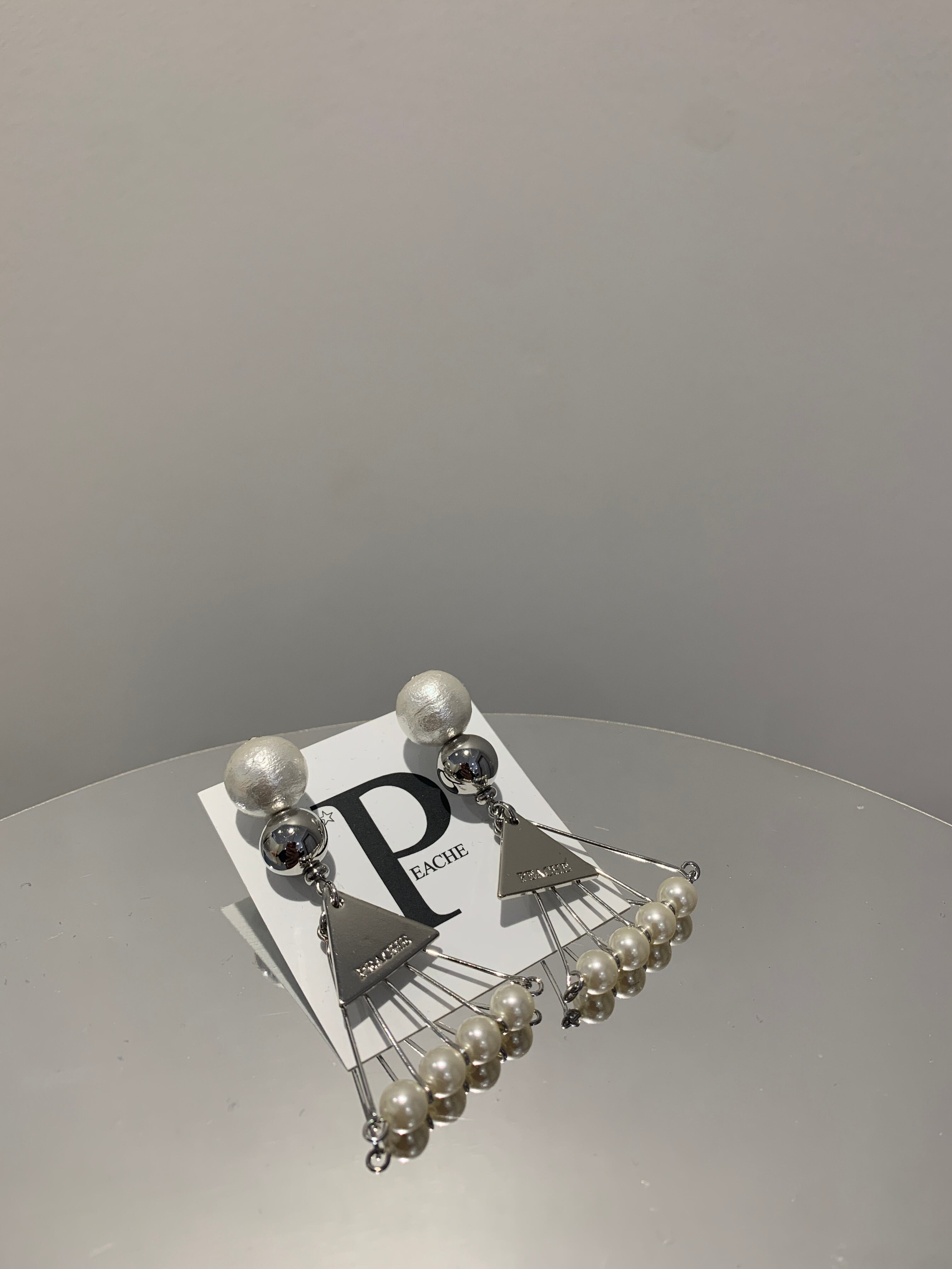 pearl silver triangle