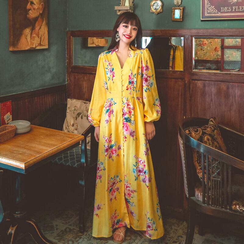 春夏新商品ニッチライトラグジュアリーリゾートスタイルロングスカートボタンウエストスケミングVネックプリントレトロワンピース 延命家ファッション89139916854