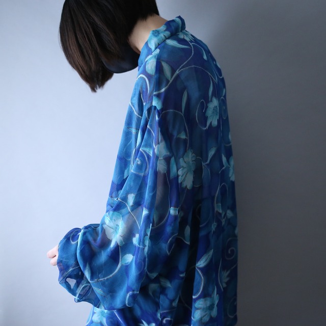 blue flower pattern over silhouette see-through shirt