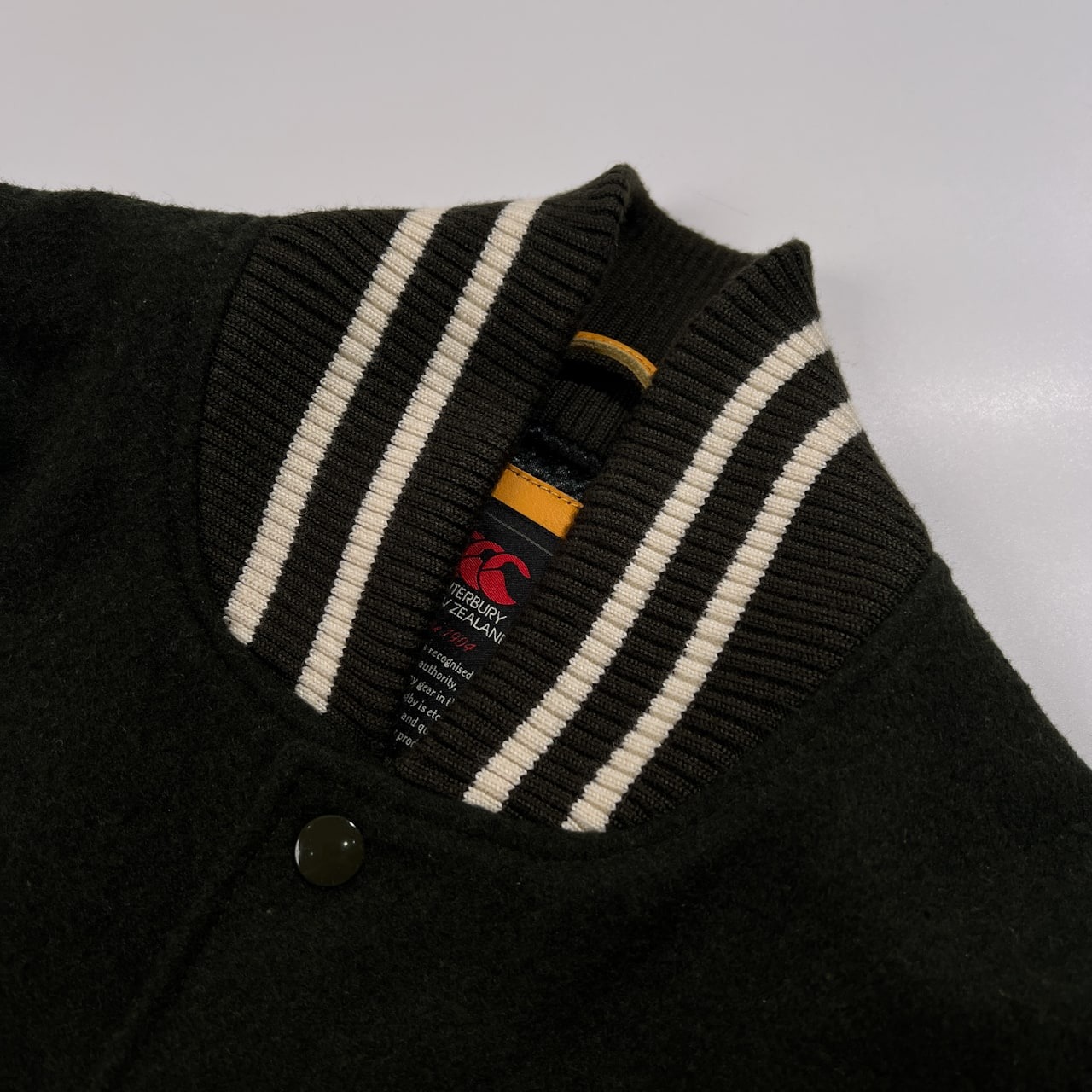 CANTERBURY カンタベリー 袖革 レザー スタジャン サイズ L /グリーン×オレンジ系/メンズ/ラグビー