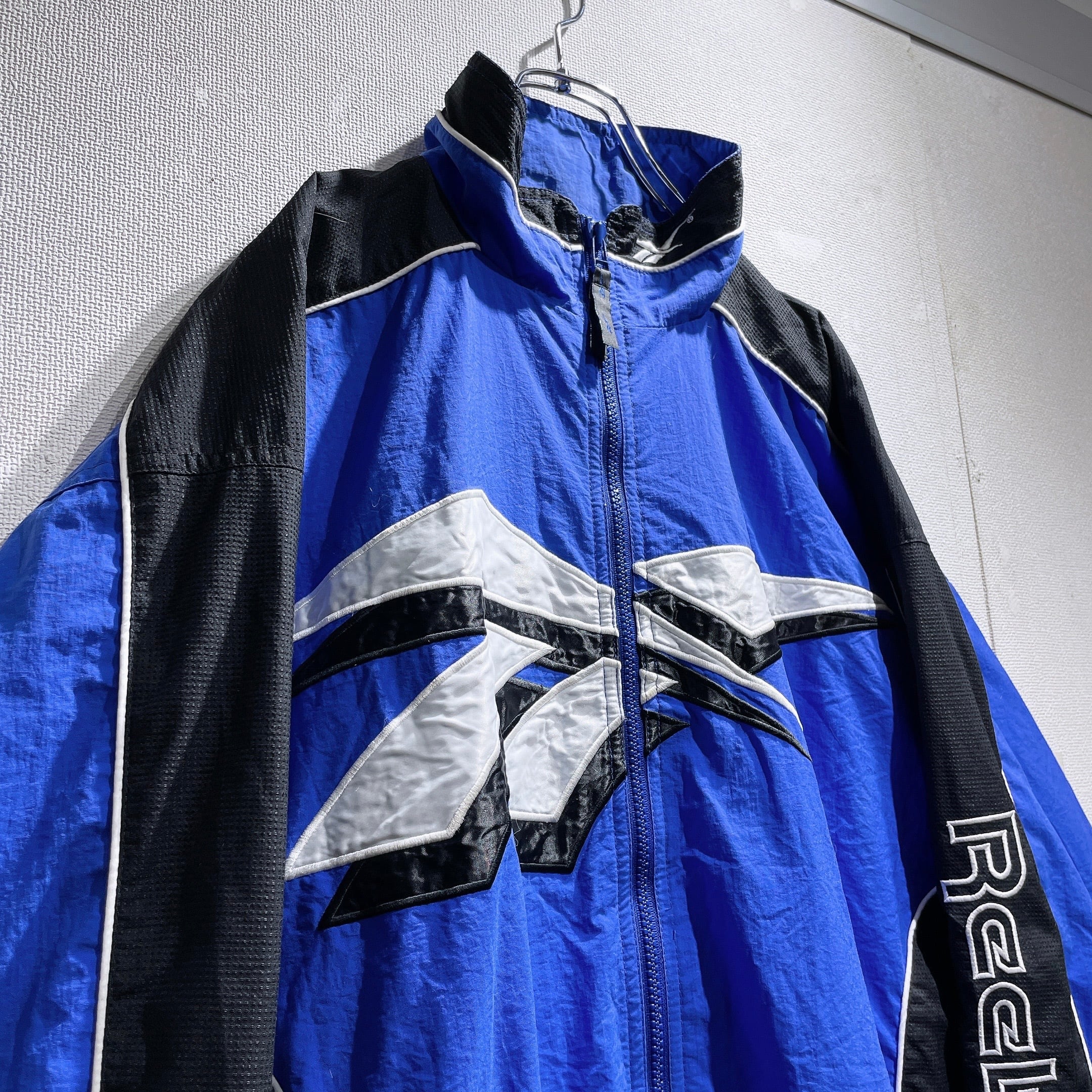 1990s ” Old Reebok ” Big vector logo Embbossed vintage Track jacket