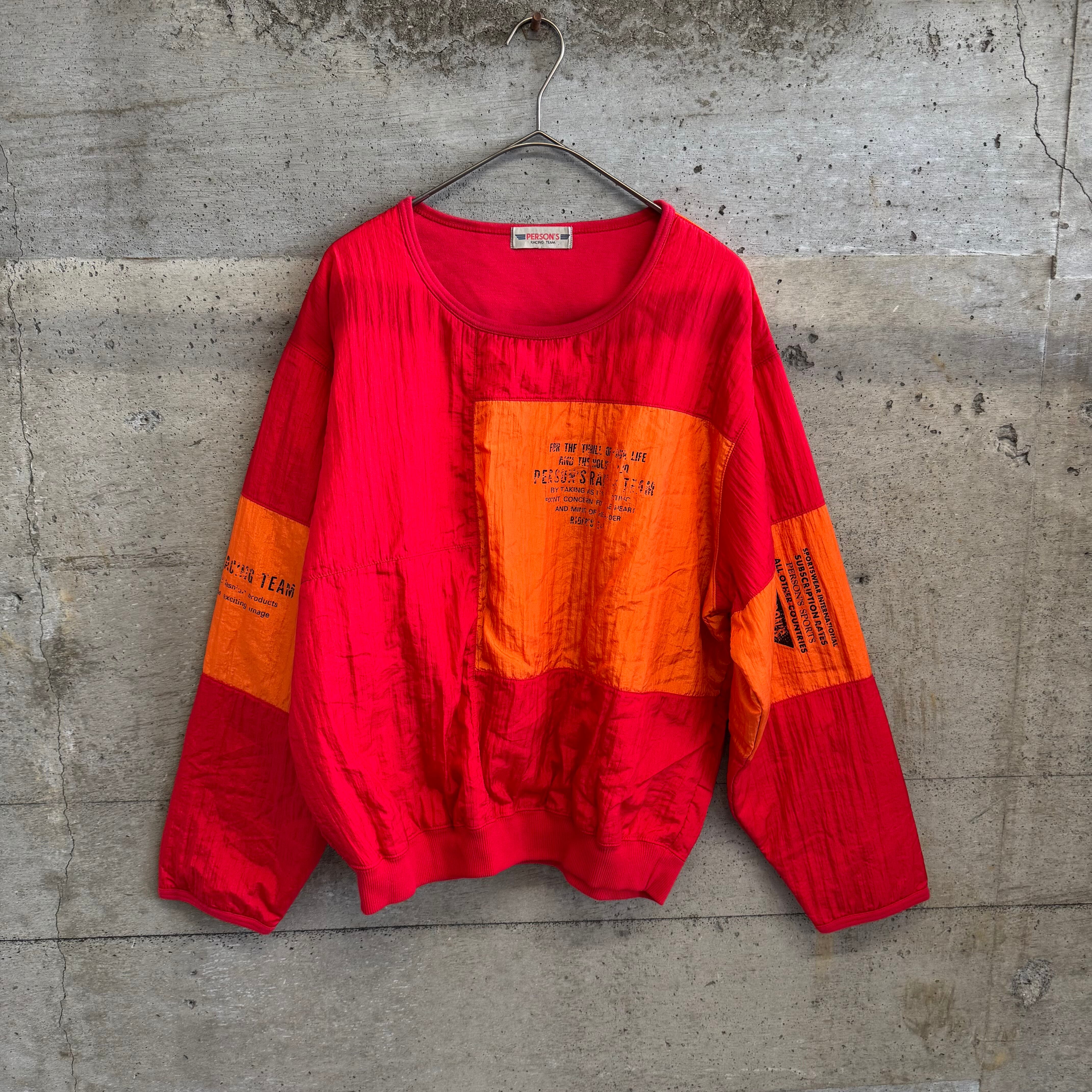 Red and orange nylon pullover