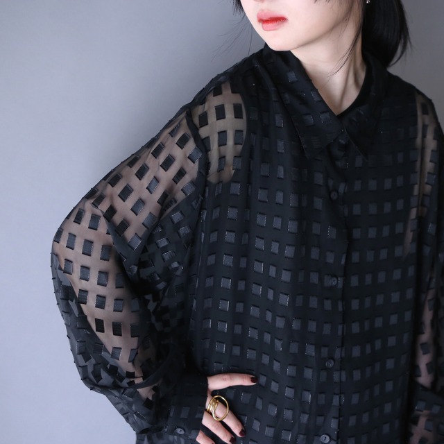 black one-tone full block pattern XX over silhouette black see-through shirt