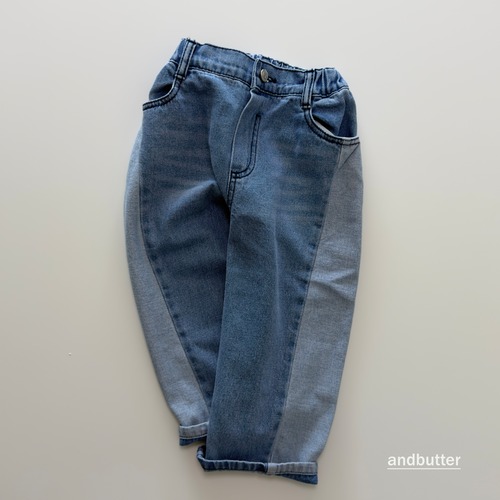 《予約10％OFF 》 カーブド配色デニムパンツ・ANDBUTTER