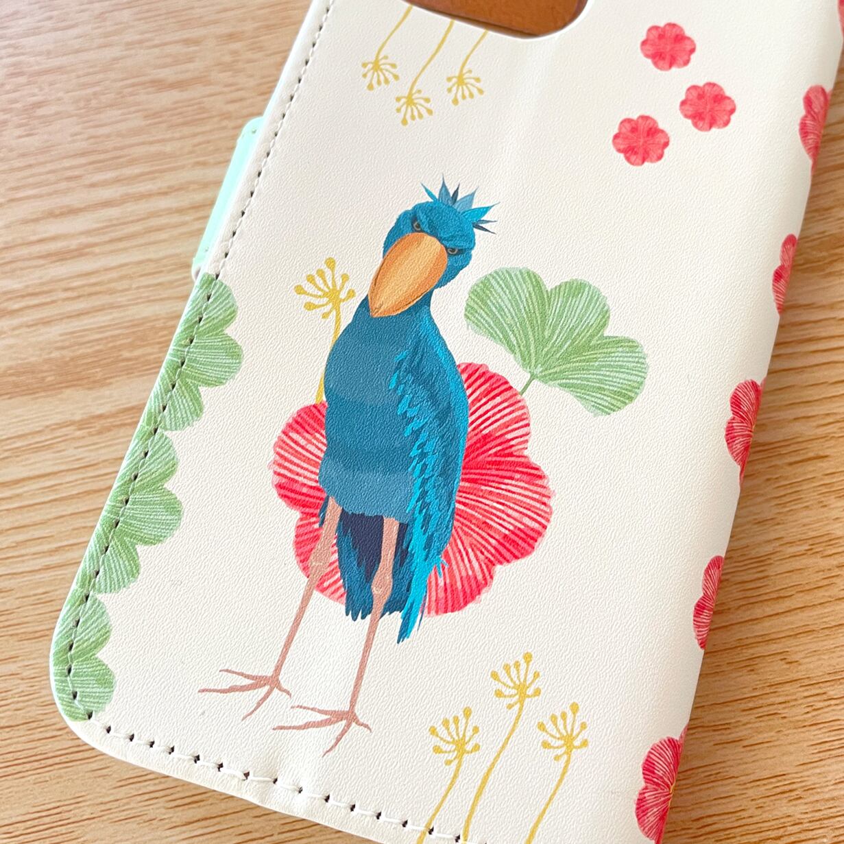 受注製作品】花とハシビロコウのiPhoneケース《Android対応》手帳型