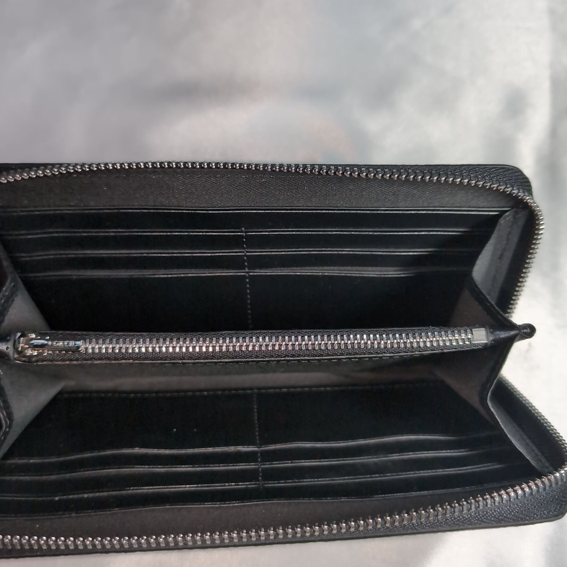 COACHコーチ ラウンドファスナー長財布 グラフィック エンボス