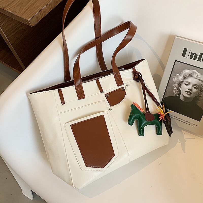 大容量のハンドバッグの女性のバッグ2020新しいトレンディなネット赤のファッションのコントラストカラーのショルダーバッグ夏の野生のトートバッグ Tiancai_Wing_Bag4029238