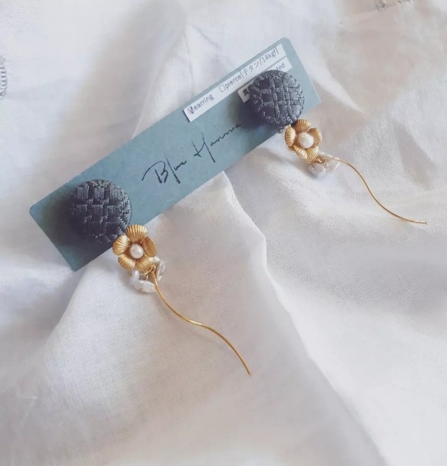 earrings, gray bottan & brass flowers
