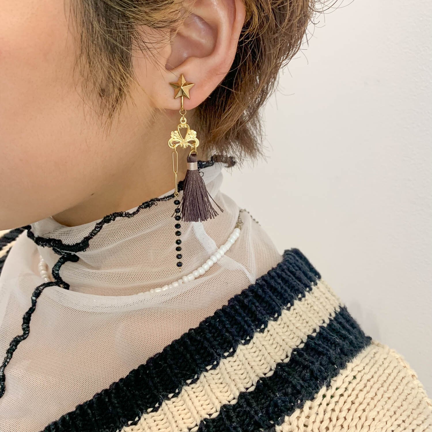 星ボタンとサラサラタッセルのロング〈ピアス/イヤリング〉 | Dua