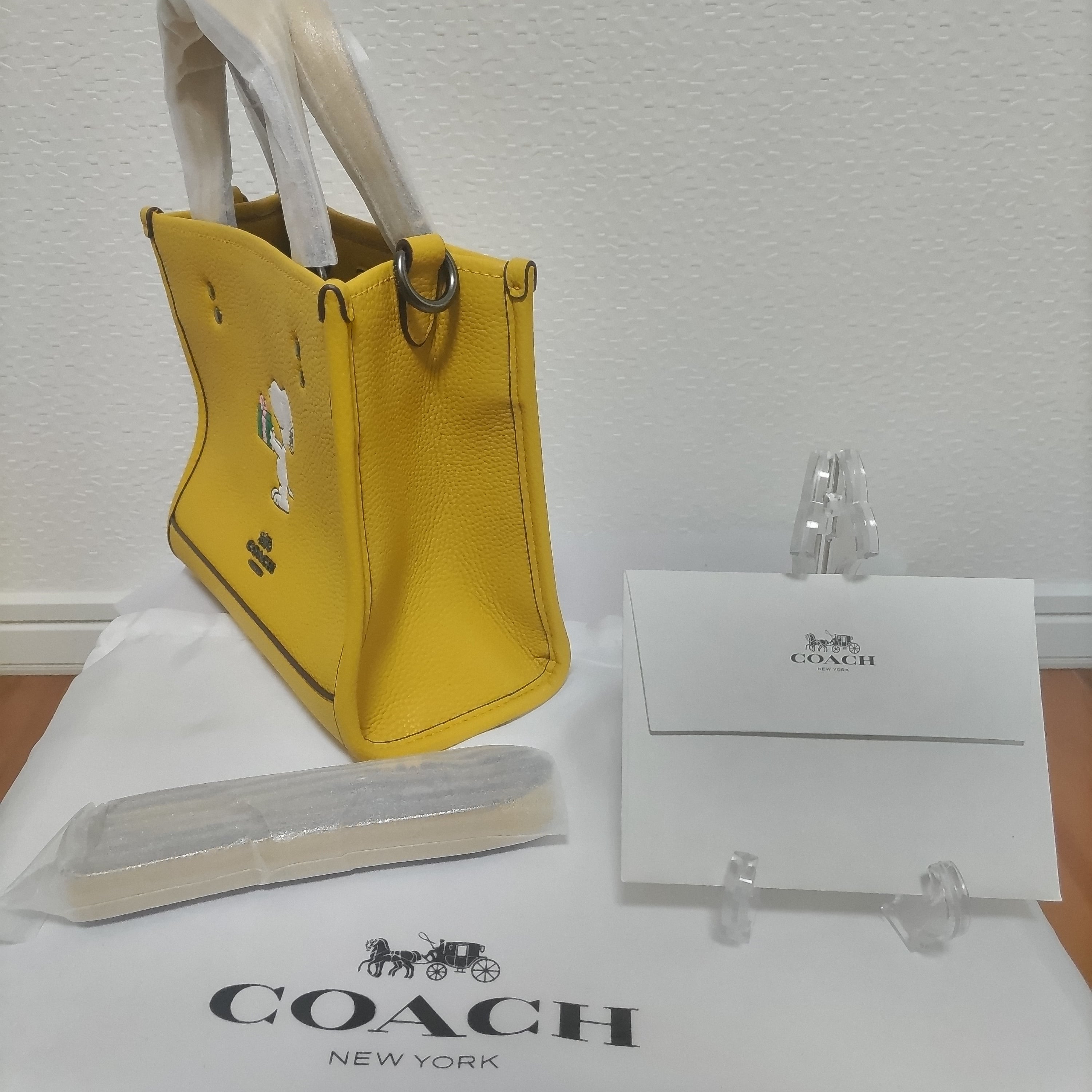 COACH コーチ スヌーピー コラボ トートバッグ デンプシートート 新作