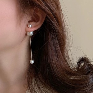 Long chain pearl earrings