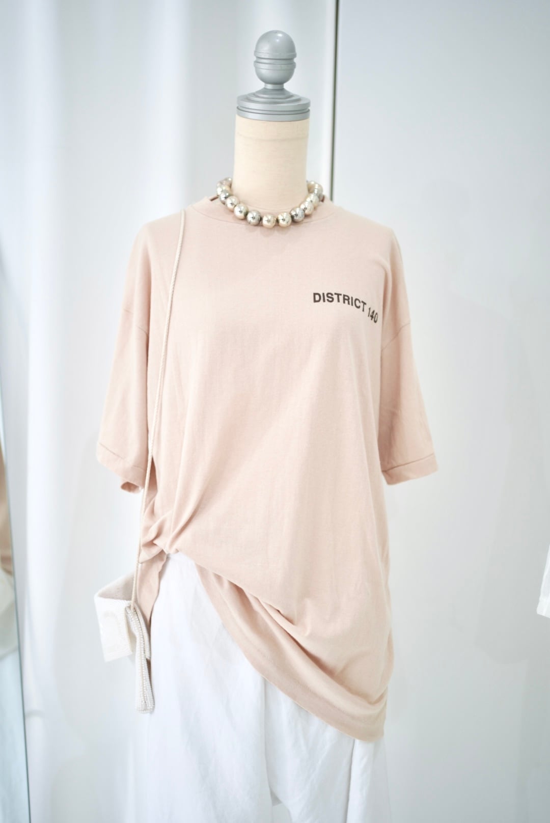 district 140 tee