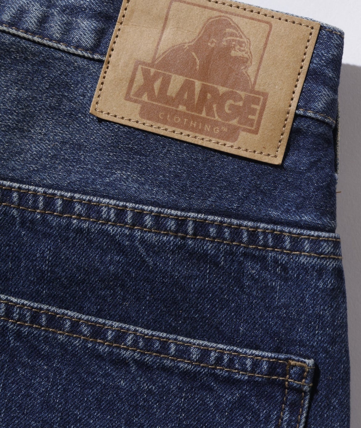 XLARGE OLD ENGLISH BAGGY DENIM PANTS | バイシクルショップサイトウ