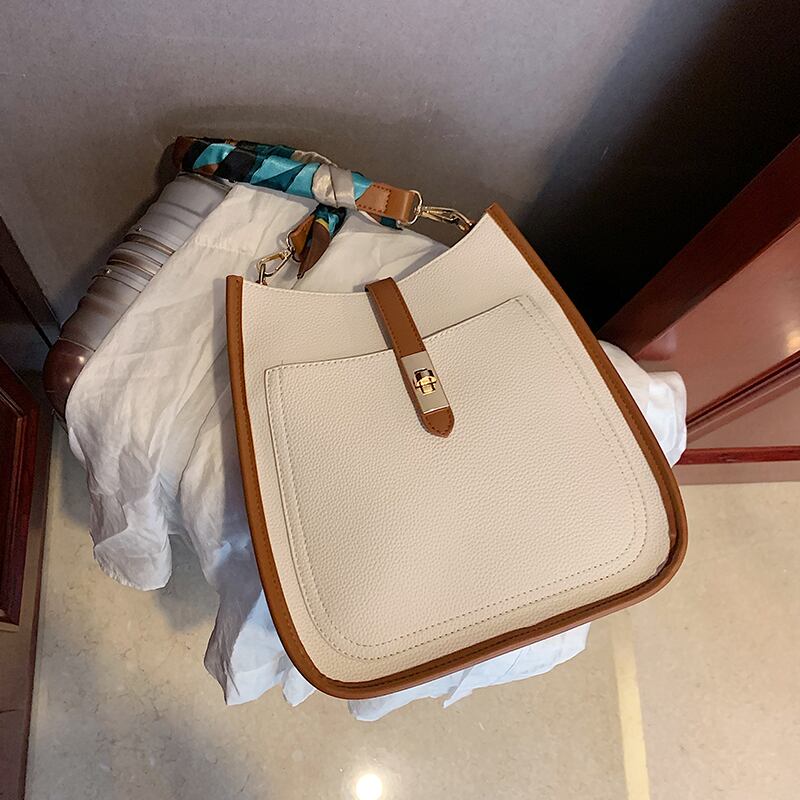 フランスのニッチなレディースバッグ2020新しい流行のファッションワイルドインシングルショルダーサマーネットレッドメッセンジャーバケットバッグ 手作りハンドバック26251169535