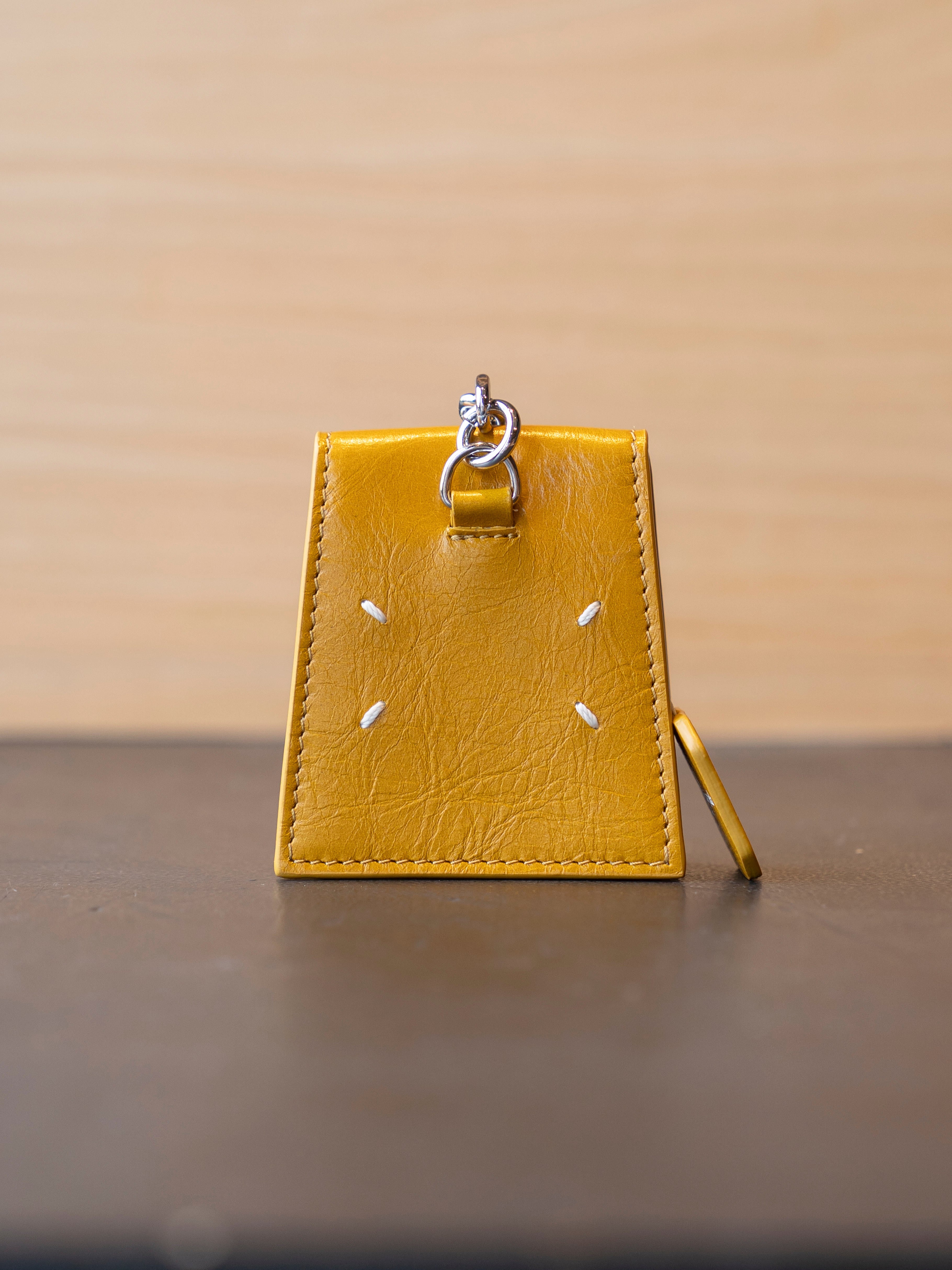 MAISON MARGIELA 4 STITCH LEATHER TEA BAG CHARM Yellow