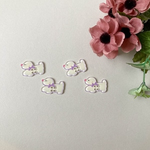 リボンをつけた白い垂れ耳犬モチーフボタン(26mm)