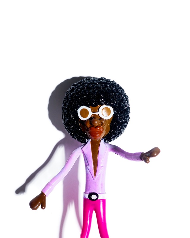 Wiggly Afro-Haired Doll Toy