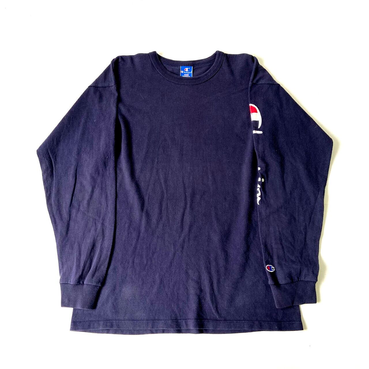 90年代 USA製 青タグ Champion チャンピオン 袖 ロゴプリント 長袖Tシャツ ロングTシャツ メンズL 古着 カレッジ ネイビー 紺色  袖プリ ロンT【ロングＴシャツ】【CS2301-50】 | cave 古着屋【公式】古着通販サイト