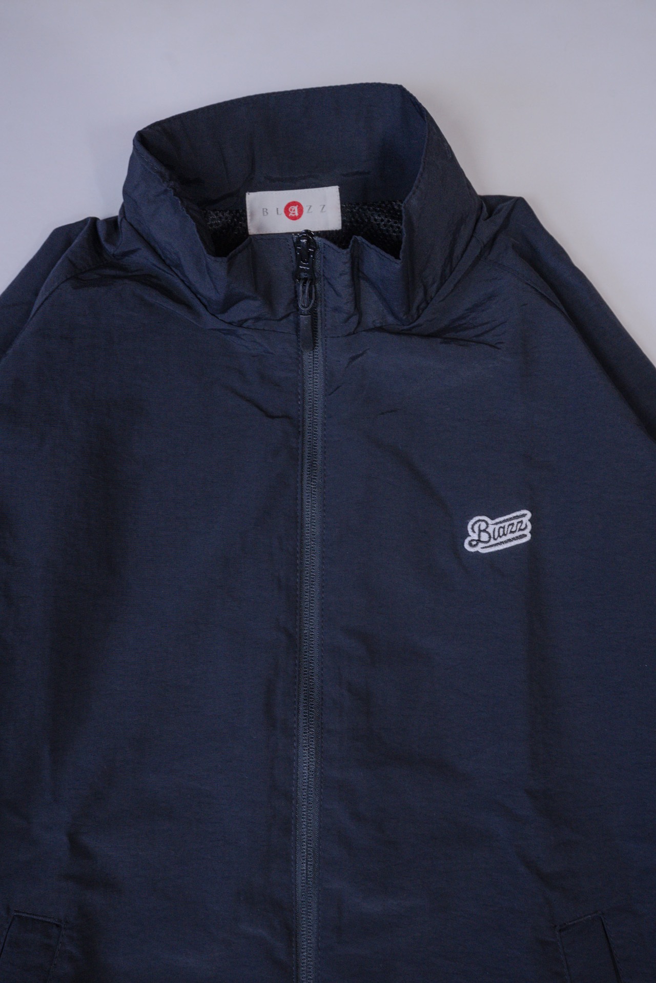 Logo Reflector Nylon Training Jacket [BLACK]