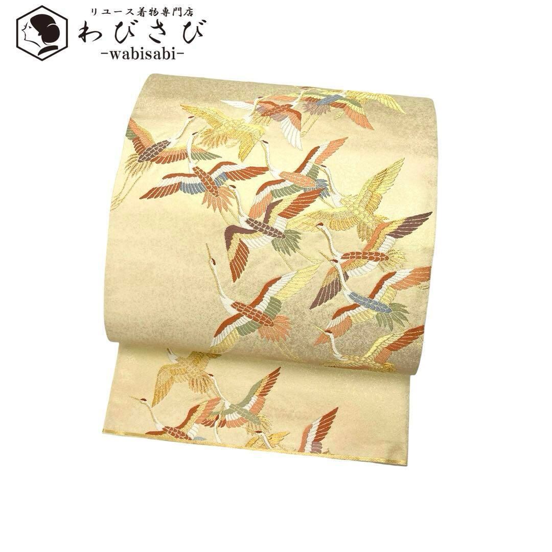 袋帯 彩り鮮やかな美しい飛翔鶴の群れ 金糸 鳥の子色 O-3862  